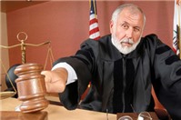 Vắng mặt chồng, tòa án có xét xử vụ án ly hôn?